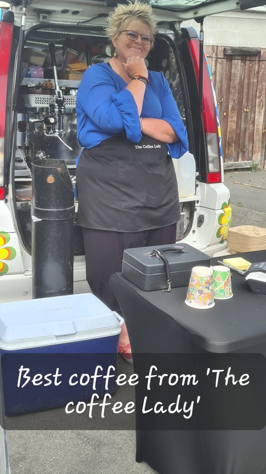 The Coffee Lady smiling at the coffee van